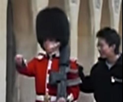 Queens-Guard-draws-gun-on-stupid-jerk-tourist-who-touched-him